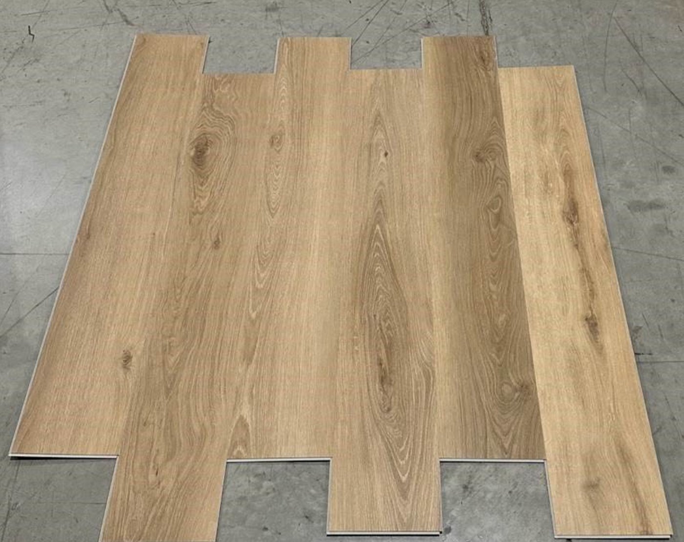 Natural Oak planks laid out on the warehouse floor showing plank-to-plank color variation